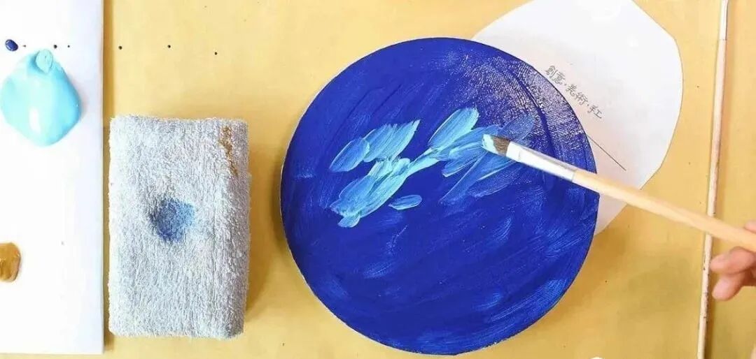 then, in the upper middle area, brush some sky blue