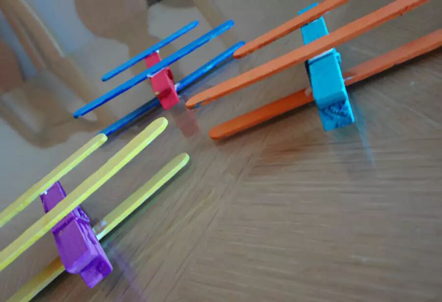 Use a wooden clothespin to clamp a bamboo skewer or disposable chopstick