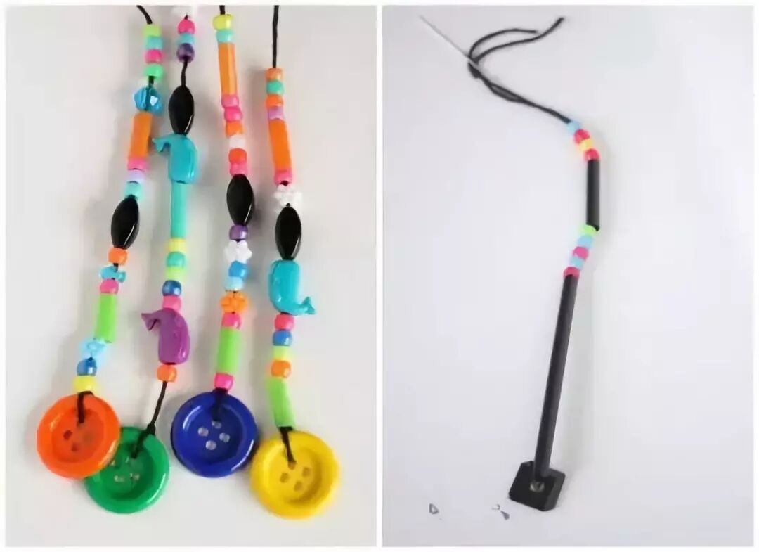 Make holes at the bottom and opening of the plastic bottle, and thread the beaded string through