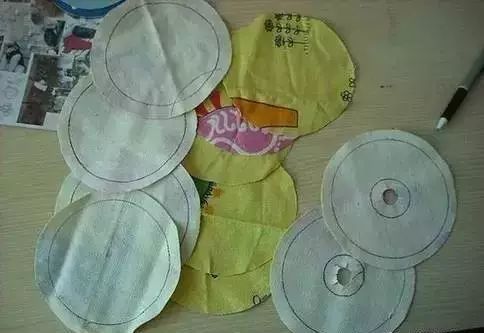 Wrap CDs with felt or your favorite fabric