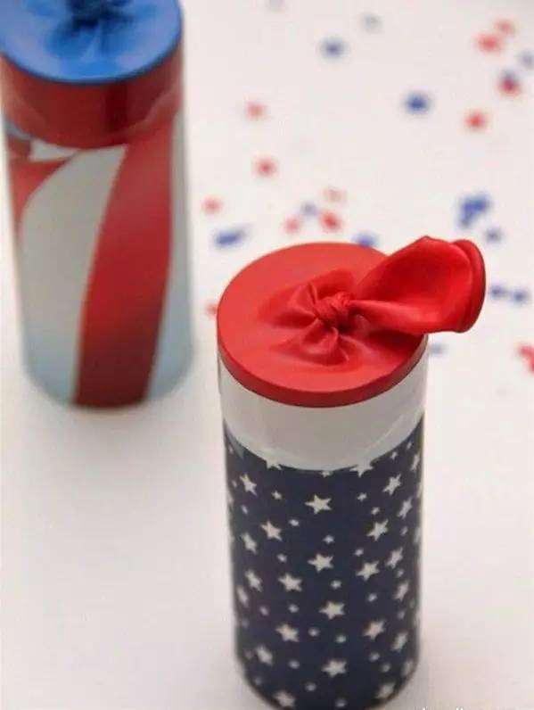 Decorate the toilet paper roll with wrapping paper