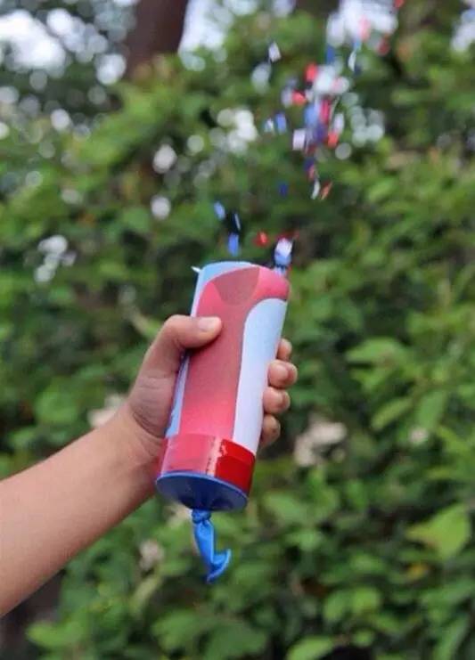 Put in colorful cut paper, pull the balloon knot, and release to shoot the paper out