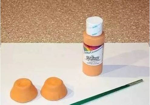 Paint the egg carton cups evenly