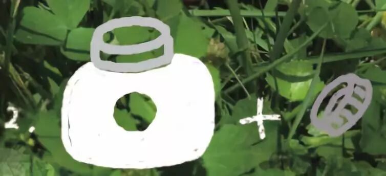 Use a mineral water bottle cap to press into the side of the small bottle to create a circular indentation